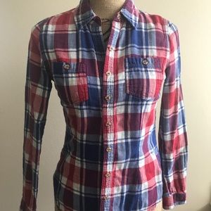 Plaid red white and blue button up shirt